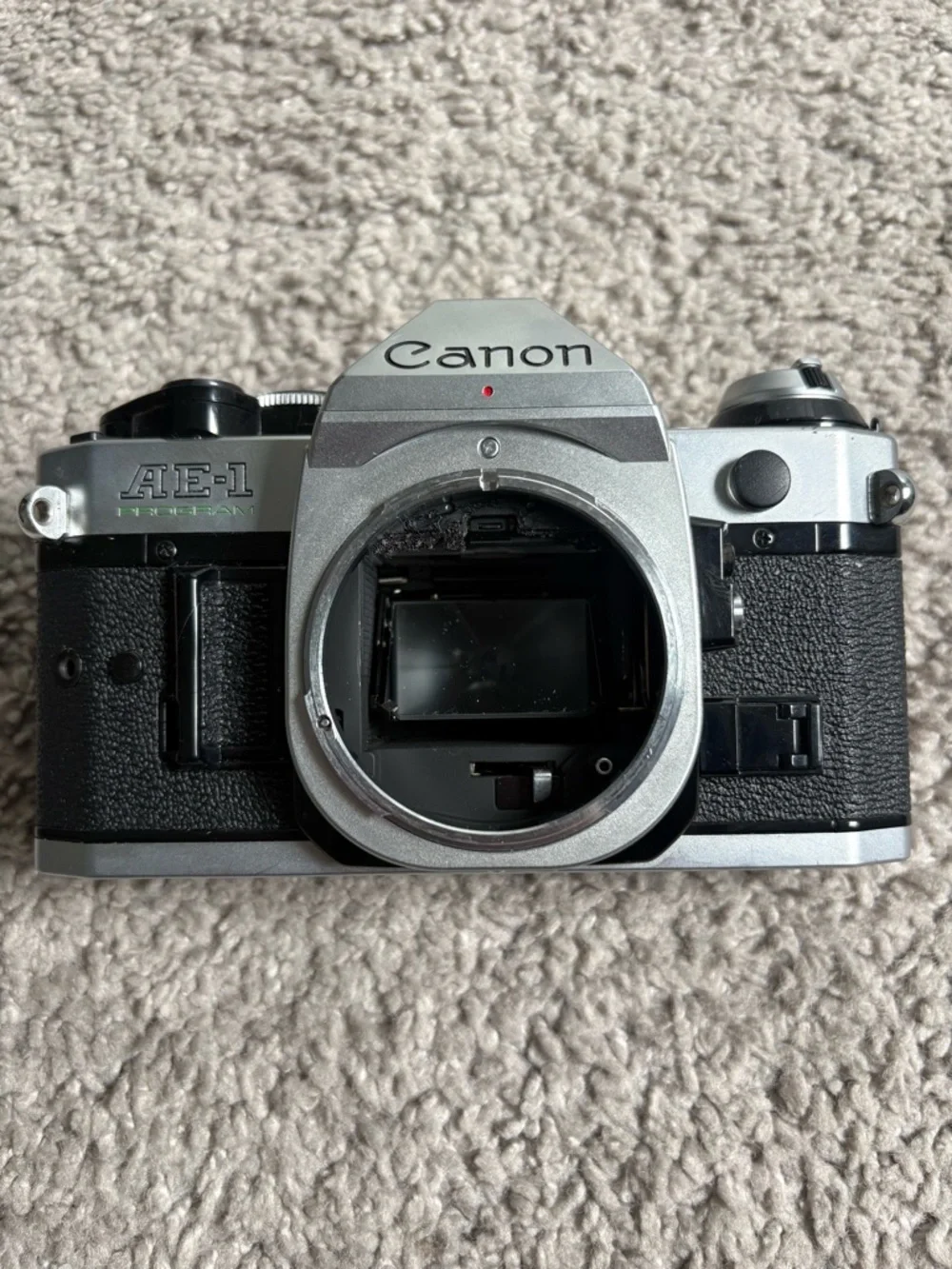 Canon JAPAN AE-1 35mm SLR Film Camera + Sakar Zoom Lens Bundle – Untested